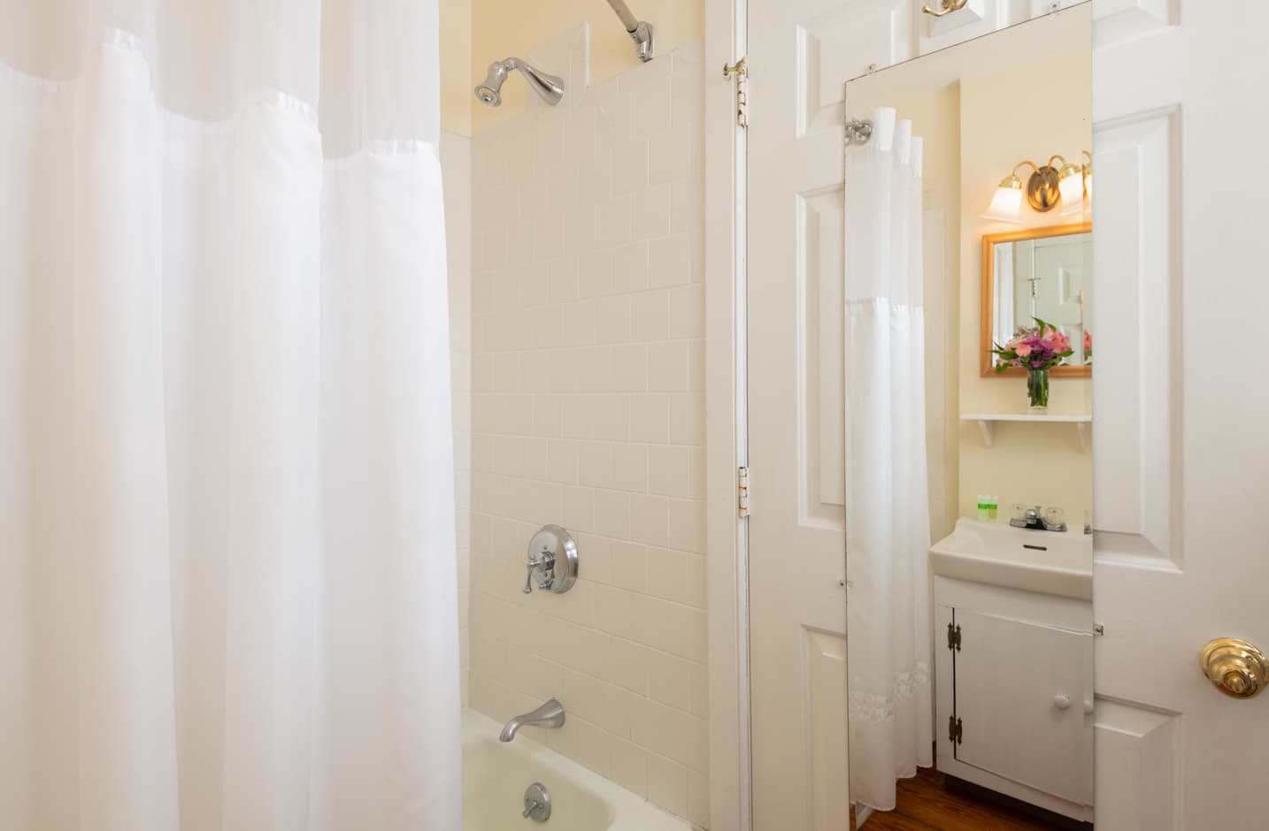 Bathroom with a tub and shower combo