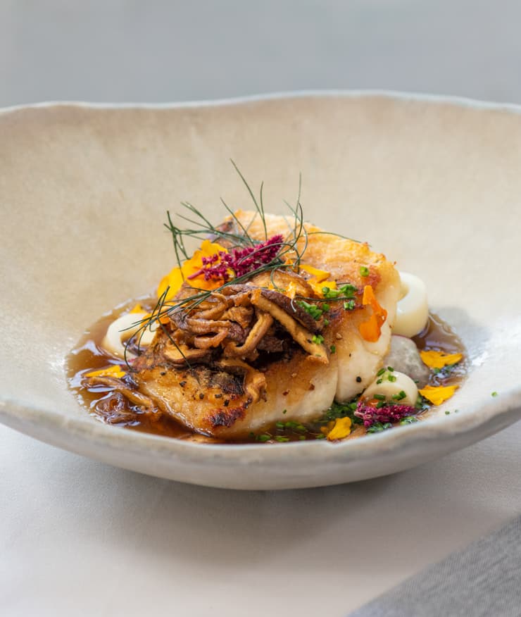 Exquisite entree from Ashby Inn & Restaurant served in a handmade bowl