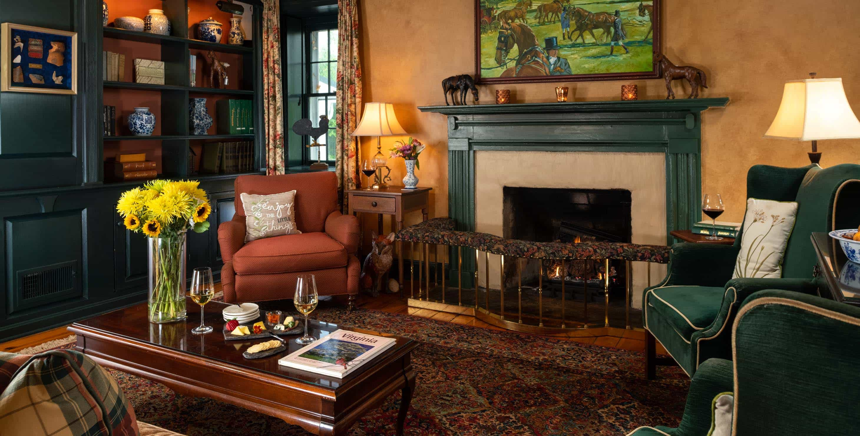 Common sitting room with fireplace and coffee table