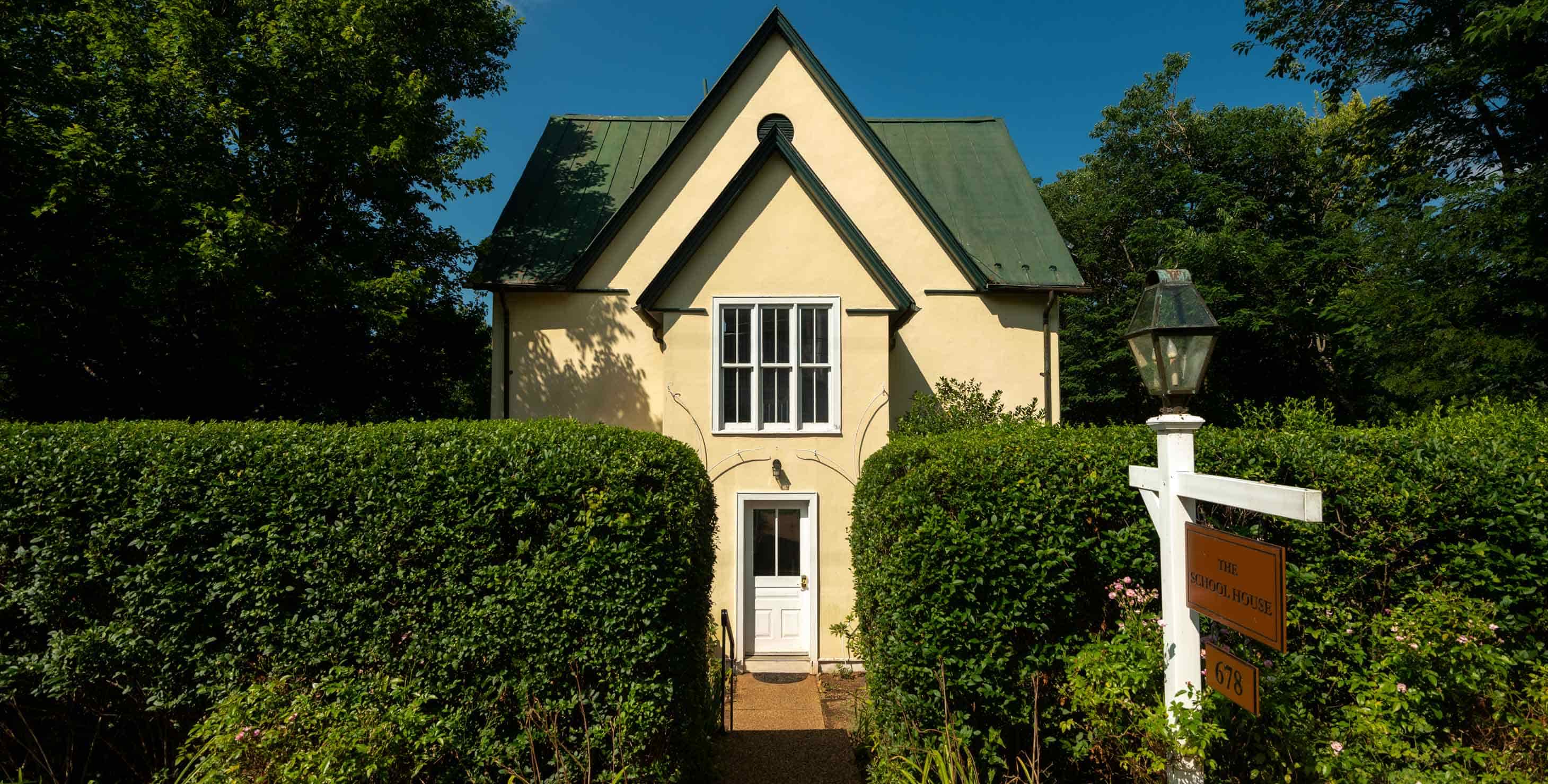 Exterior front entrance of the School House